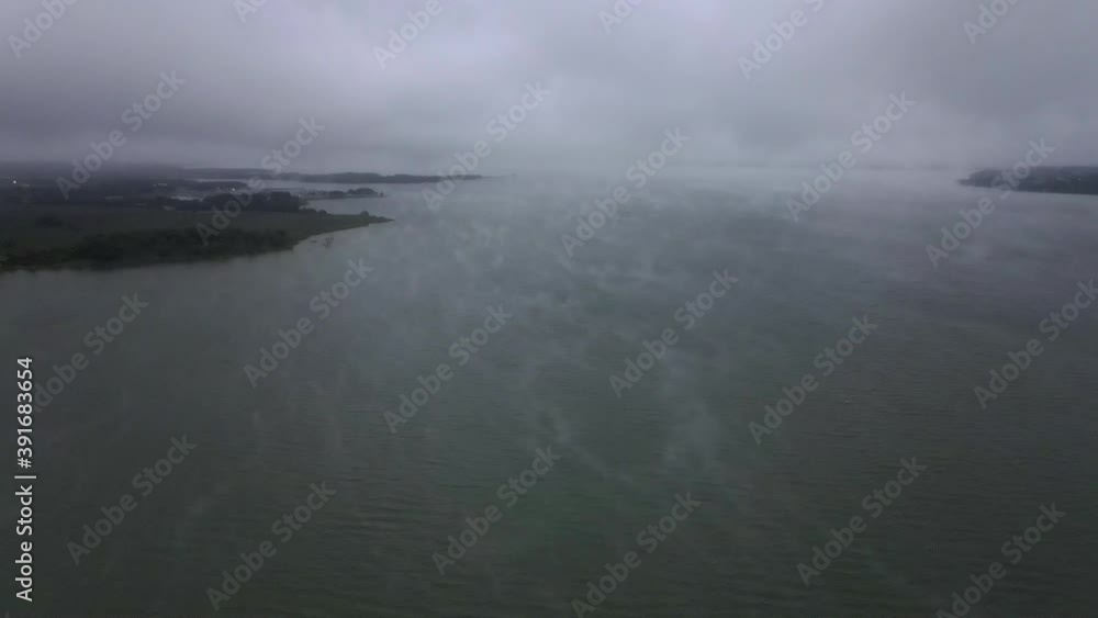 Aerial view of Lake Waco while ascending into clouds on foggy day Aerial view of Lake Waco while ascending into clouds on foggy day