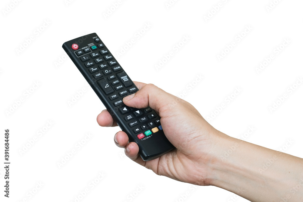 His hand is holding the remote control and operate the remote control. on the White Background . Concept of Technology His hand is holding the remote control and operate the remote control. on the White Background . Concept of Technology