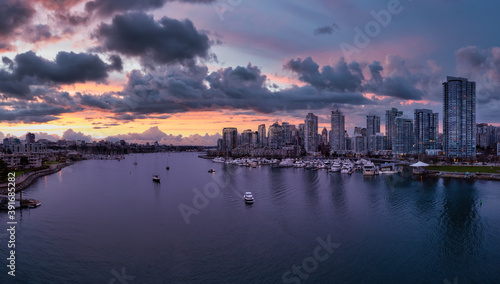 False Creek, Vancouver, British Columbia, Canada. Aerial Panoramic View of a Modern Downtown City View. Dramatic Colorful Sunset Sky. © edb3_16