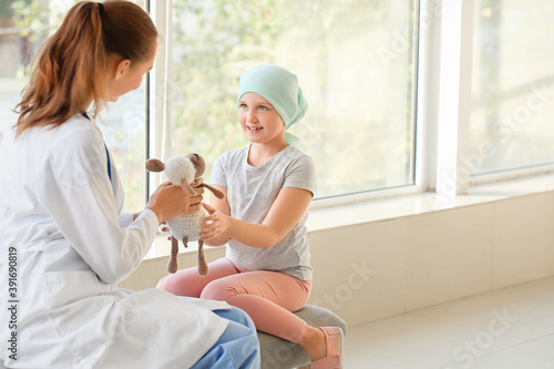 Doctor and little girl in c...