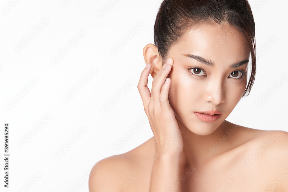 Beautiful young asian woman with clean fresh skin on white background, Face care, Facial treatment, Cosmetology, beauty and spa, Asian women portrait Beautiful young asian woman with clean fresh skin on white background, Face care, Facial treatment, Cosmetology, beauty and spa, Asian women portrait