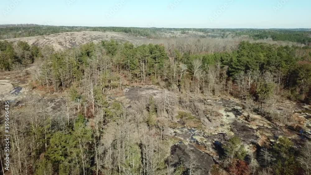 Abandoned quarry outside of Atlanta, Georgia with old buildings, lake, and mining artifacts Abandoned quarry outside of Atlanta, Georgia with old buildings, lake, and mining artifacts