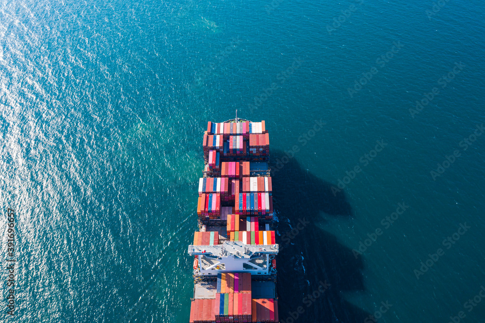 Aerial view cargo ship of business logistic transportation sea freight,Cargo ship, Cargo container in factory harbor at industrial estate for import export around in the world, Trade Port / Shipping 