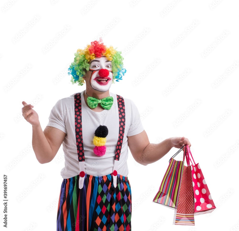 Funny clown with shopping bags isolated on white background Funny clown with shopping bags isolated on white background