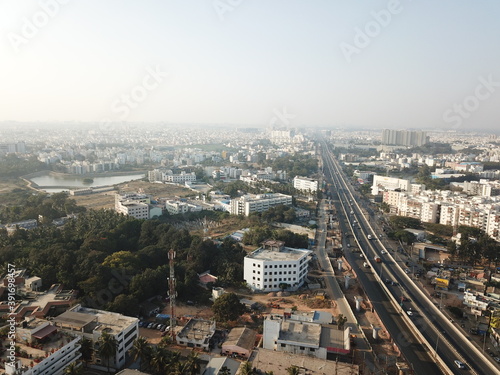 Aerial lake view of the buildings in the center of Bangalore city  © Beegru Realty