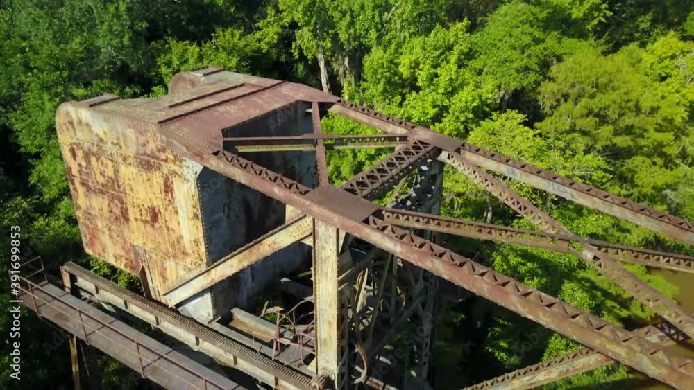 Train track and iron truss bridge ruin over the Altamaha River in South Georgia Train track and iron truss bridge ruin over the Altamaha River in South Georgia