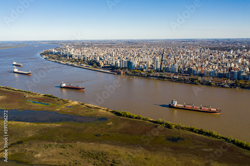 Canvas-taulu Aerial shot over Parana River in Front of Rosario City