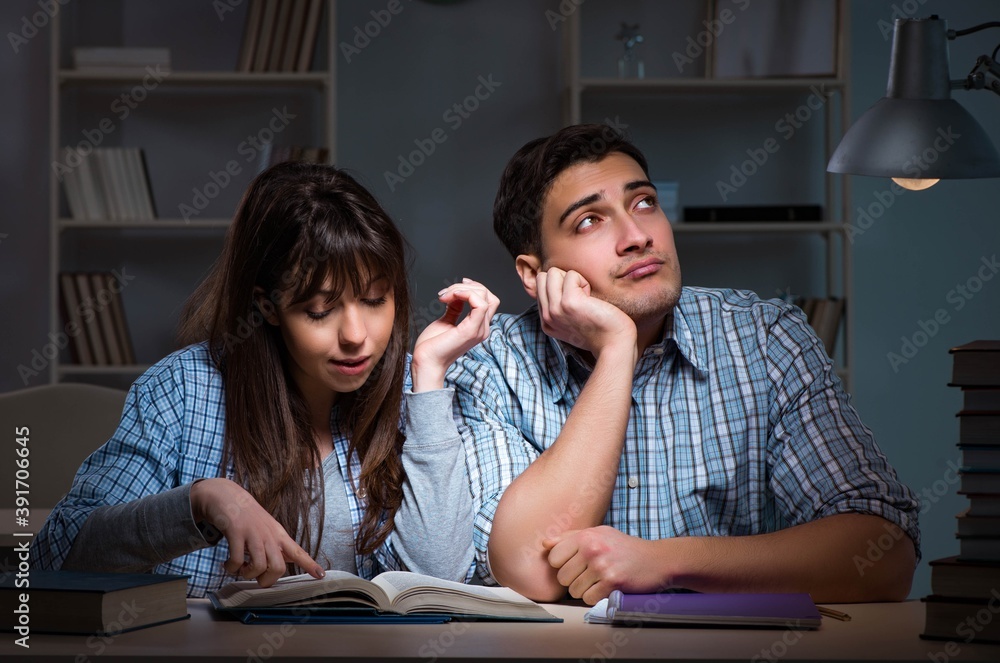 Two students studying late at night Two students studying late at night