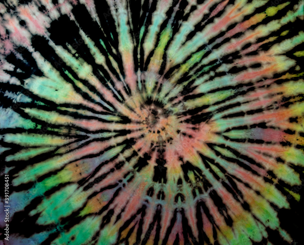 Spiral tie dye texture. Reverse swirl tiedye pattern. Tie-dye