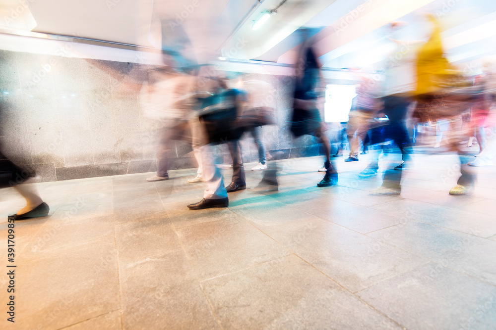 Crowd of People as Pedestrians in Metro, blurred Picture as Background Crowd of People as Pedestrians in Metro, blurred Picture as Background