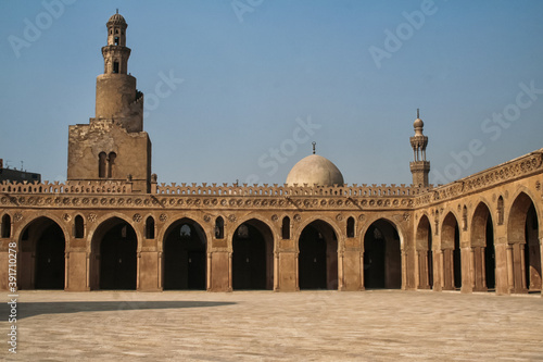 CAIRO, EGYPT - Dec 11, 2007: Courtyard, minaret and ablution fountain (sabil) of the Ibn Tulun Mosque (Cairo, Egypt) photo