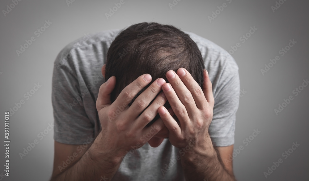 Caucasian depressed man at home. Caucasian depressed man at home.
