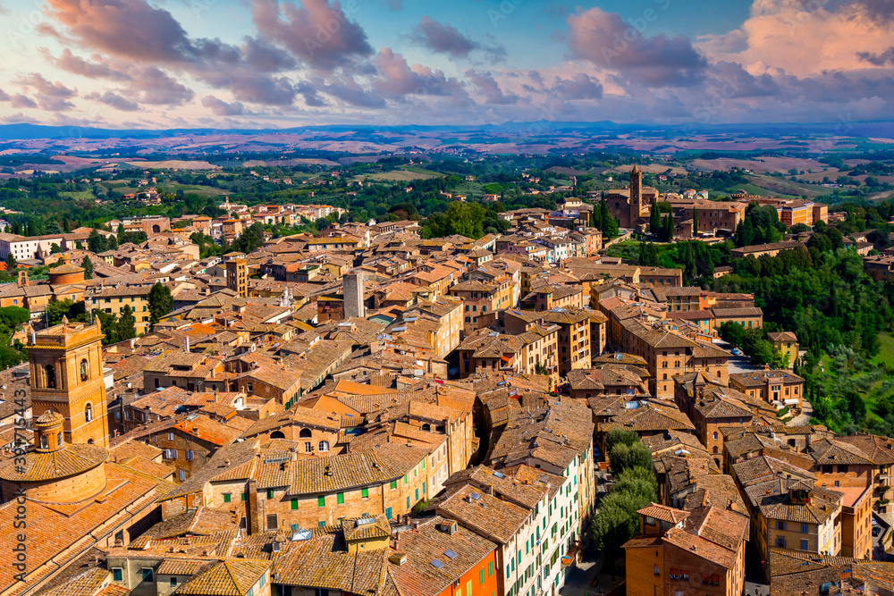 Fototapeta premium Siena beautiful medieval town in Tuscany, Dome and Bell tower of Siena Cathedral, Old Town medieval city of Siena, Tuscany, Italy