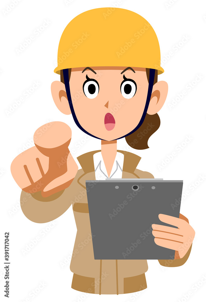 指差し確認するヘルメットを装着したベージュ色の作業着の女性
