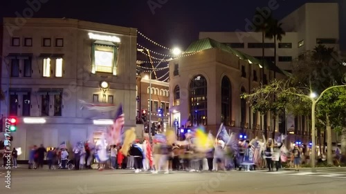 Fast moving timelapse traffic light trails on downtown Rodeo drive nightlife scene