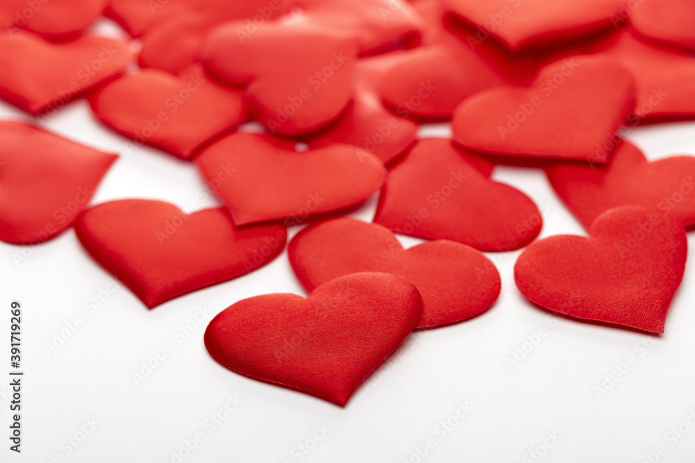 Fototapeta premium Romantic greeting card. A set of decorative elements in the form of satin hearts.