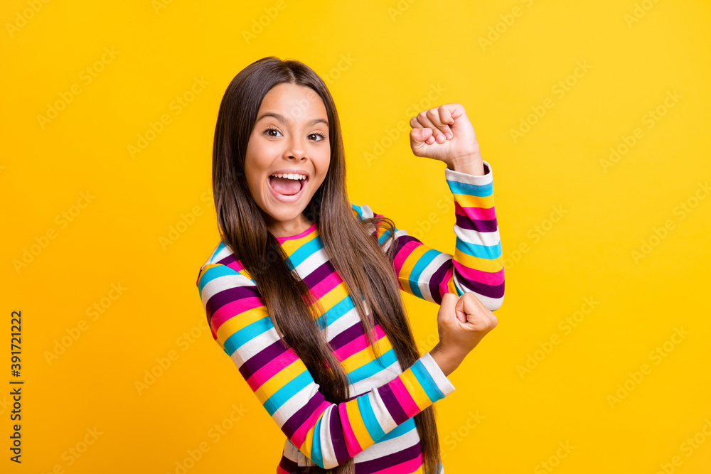 Photo of small girl open mouth surprised expression wear striped shirt isolated yellow color background Photo of small girl open mouth surprised expression wear striped shirt isolated yellow color background