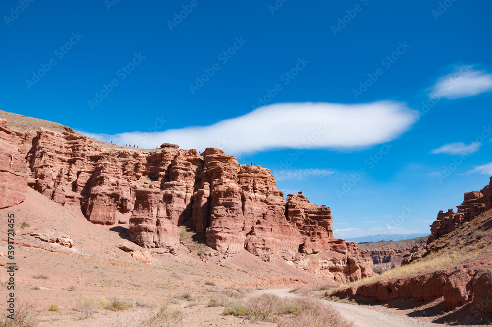 Picturesque view over Charyn canyon, a geological formation of amazing big red sand stone, with vivid blue sky, National natural park in Almaty region, Kazakhstan