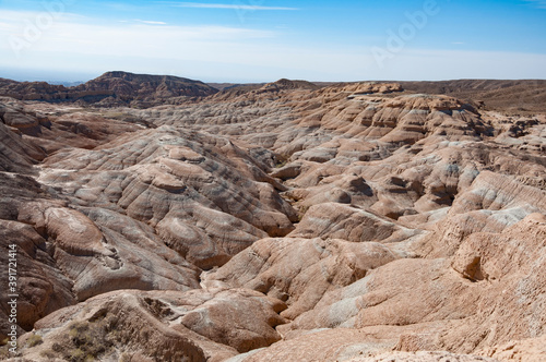 Scenic landscape of hills (like mars) with amazing stone formations in Altyn-Emel National Park, Kazakhstan