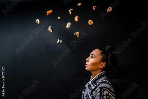 Japanese kimono model with sushi smiling