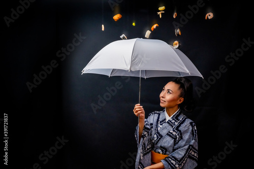 Japanese Kimono model with umbrella and sushi falling