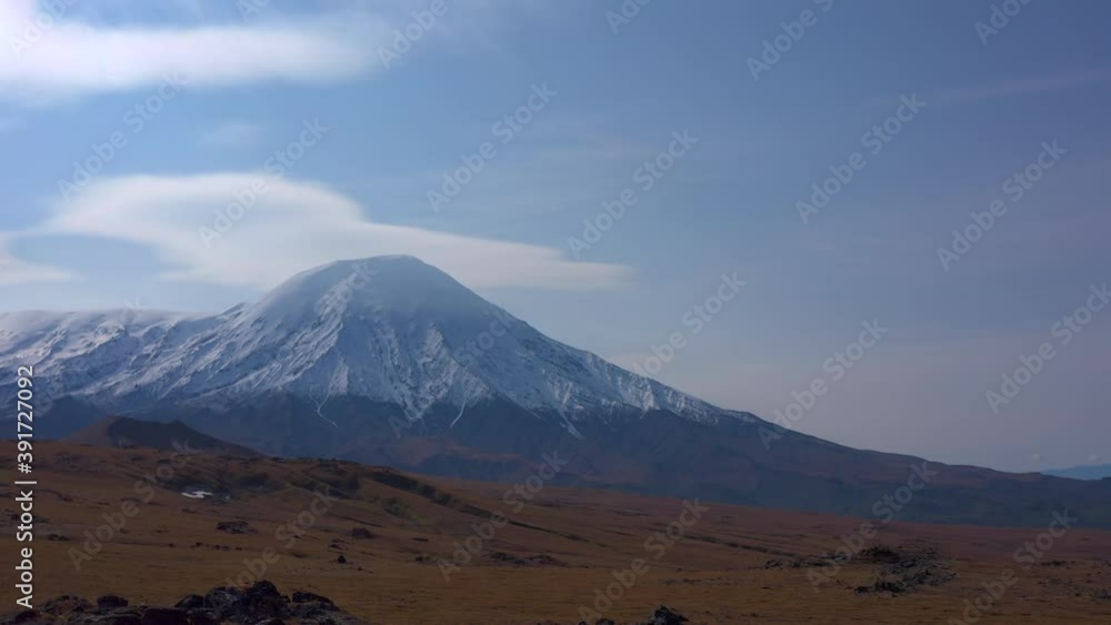 Aerial view of Plosky Tolbachik Volcano. Amazing nature of Kamchatka. Autumn landscapes of central Kamchatka. Travel to the Kamchatka Peninsula. Aerial view of Plosky Tolbachik Volcano. Amazing nature of Kamchatka. Autumn landscapes of central Kamchatka. Travel to the Kamchatka Peninsula.