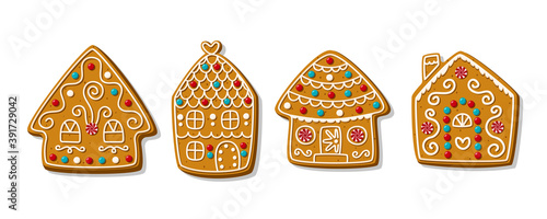 Set of cartoon festive gingerbread houses. Festive homemade Christmas cookies. Vector illustration.