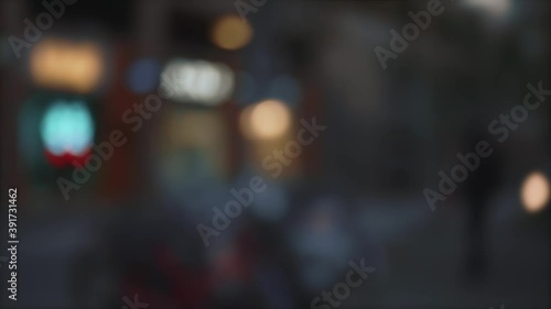 Wallpaper Mural Footage of city night with abstract colorful bokeh. Defocused silhouettes of people walks along the night streets Torontodigital.ca