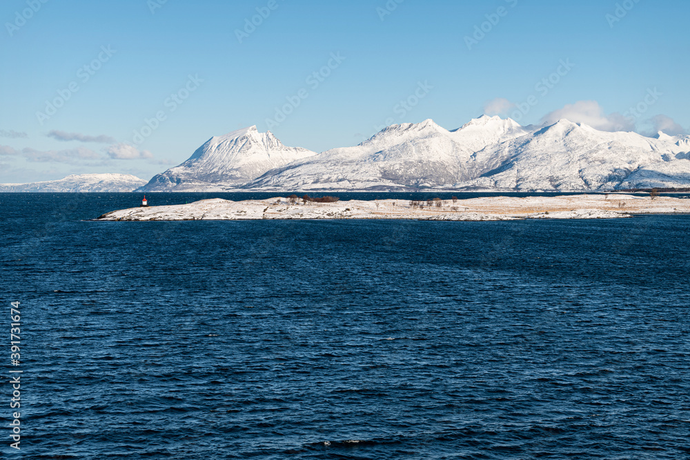 Snow covered hills on the Norwegian Coast in winter