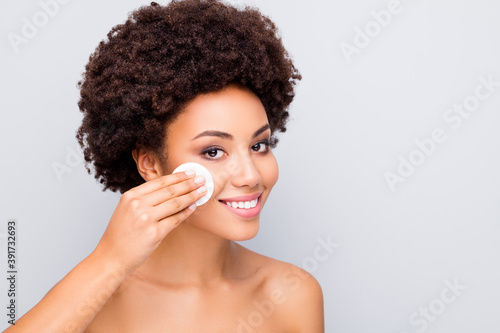 Close-up portrait of her she nice attractive lovely cheerful wavy-haired girl cleansing facial tonic clean clear smooth silky soft smooth skin isolated on light white gray color pastel background