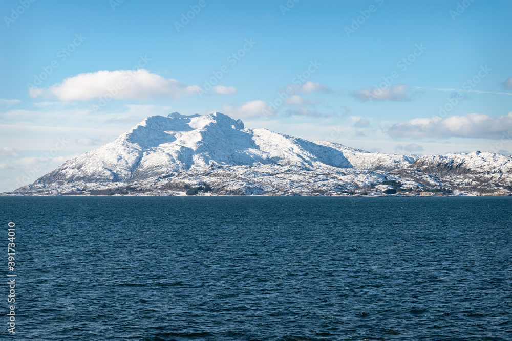 Snow covered hills on the Norwegian Coast in winter