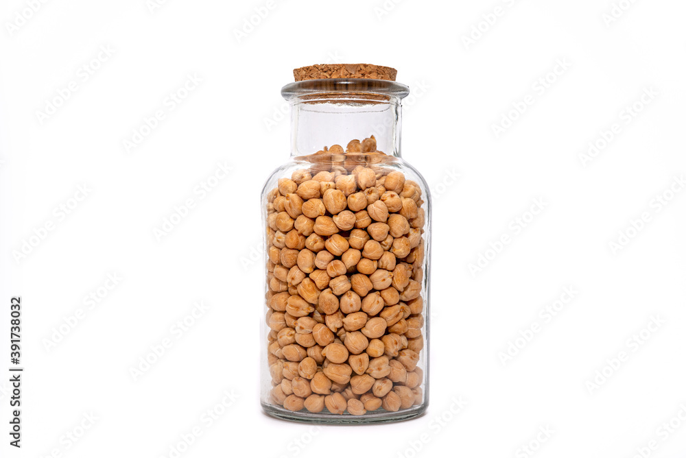 A Jar of dried Chickpeas isolated on a white background, nutritious legumes dried and stored. Healthy food choice. A Jar of dried Chickpeas isolated on a white background, nutritious legumes dried and stored. Healthy food choice.