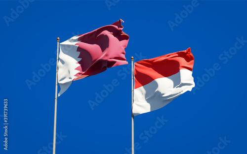 Beautiful national state flags of Qatar and Indonesia.