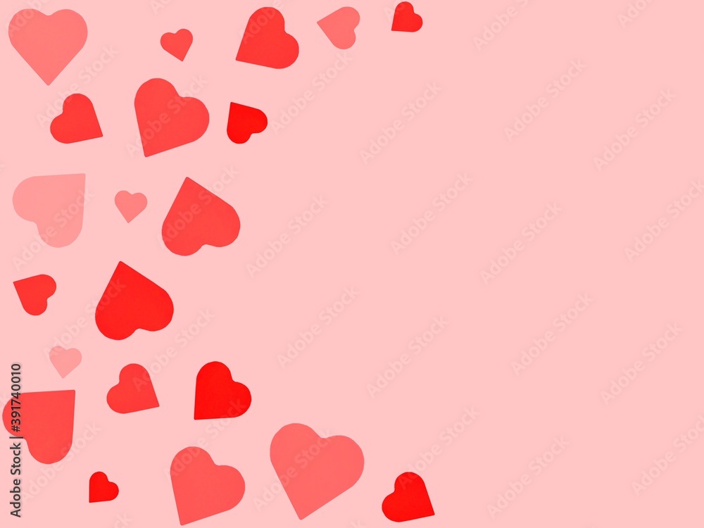 Pattern of red hearts on a pink background. A picture on the theme of Valentine's Day, wedding or love story.