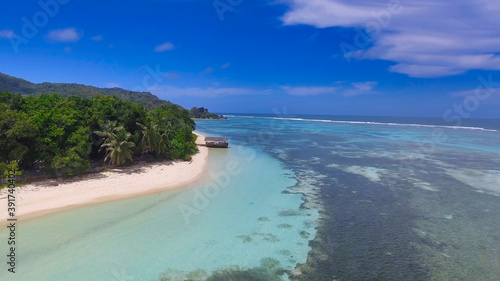 Fototapeta Naklejka Na Ścianę i Meble -  La Digue, Seychelles. Aerial view of coastline from drone perspective