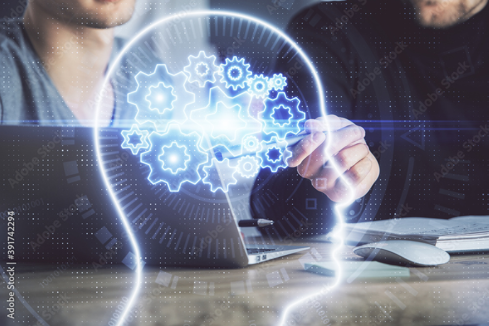 Businessman with computer background with brain theme hologram. Concept of brainstorm. Multi exposure. Businessman with computer background with brain theme hologram. Concept of brainstorm. Multi exposure.