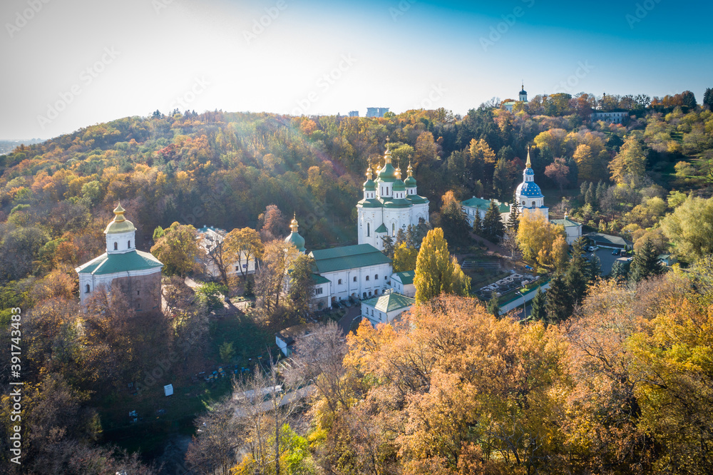 Aerial autumn sunny view of Vydubytskyi Monastery in Kyiv