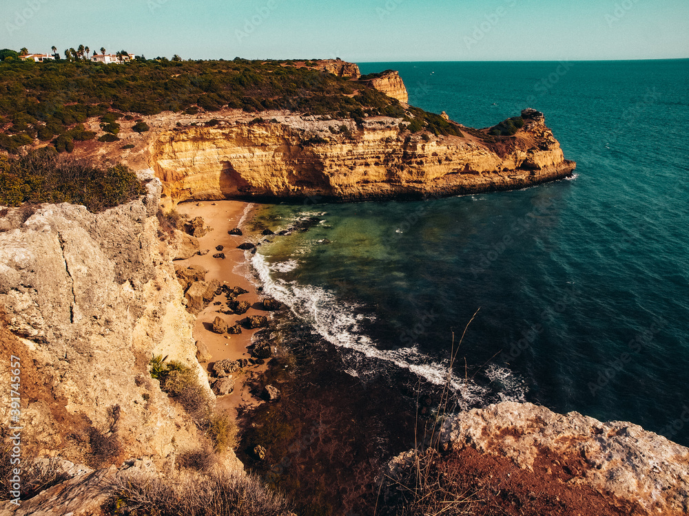 Panoramic view near Carvoeiro with rocks near Lagos in Algarve, Portugal. Cliff rocks and ocean in Algarve region, Portugal. 