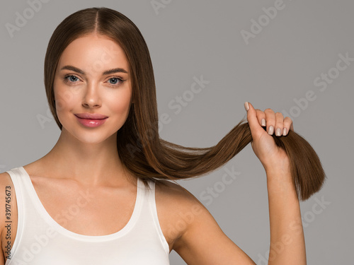 Beautiful healthy hair woman happy female smiling face healthy skin