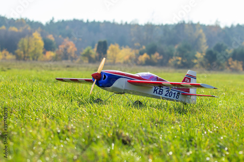 RC plane on a grassy runway