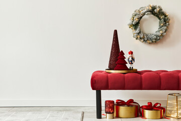 Christmas composition with decoration, christmas tree, gifts, snow and accessories in cozy home decor. Copy space. White and red. Template.