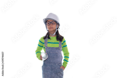 Adorable Asian girl acting in studio with construction helmet, girl with green color sweater dream to be engineer, happy girl action on white background with blueprint paper and safety white hat