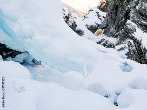 The most beautiful frozen waterfall Rjukandefossen winter landscape, Hemsedal, Norway. photo