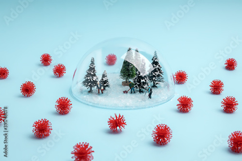 Creative coronavirus layout made with people cleaning snow under the glass dome, surrounded by virus. Minimal stay at home wallpaper. Self-isolation, coronavirus, pandemic or winter sports concept.