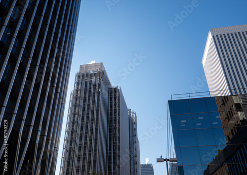 reflection of the Sun in the metallic structure of a skyscraper of AZCA business and financial district in Madrid  Spain.