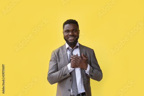 African American man makes a gesture of gratitude photo