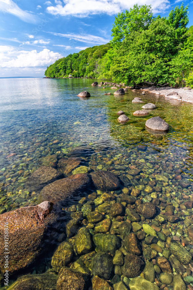 Swedish natural beach on Vattern lake Swedish natural beach on Vattern lake