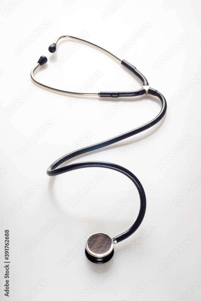 Classic medical stethoscope with one-way head on white Classic medical stethoscope with one-way head on white
