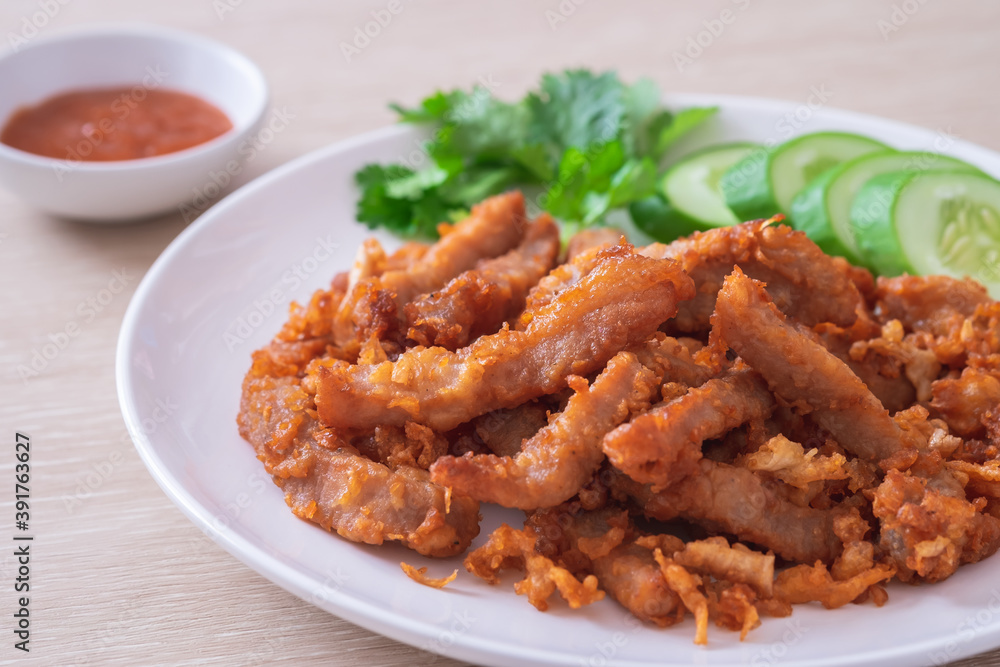Fried pork with garlic and pepper on plate, Thai food. Fried pork with garlic and pepper on plate, Thai food.