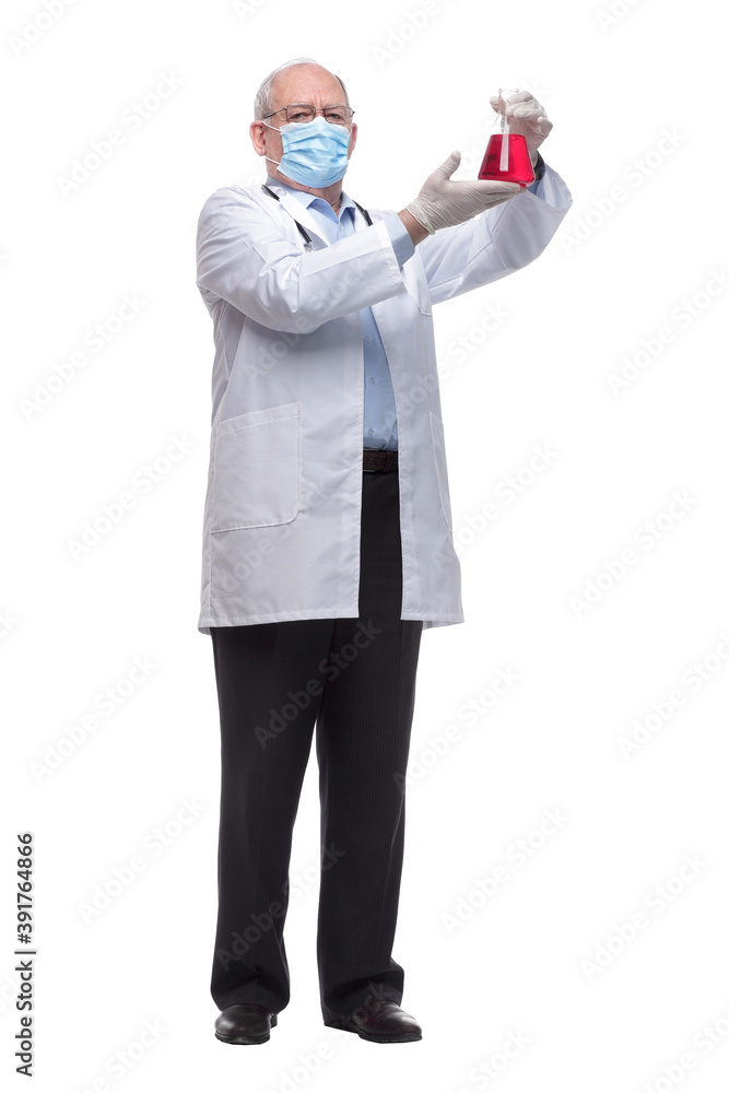 doctor in a protective mask holds a laboratory flask doctor in a protective mask holds a laboratory flask